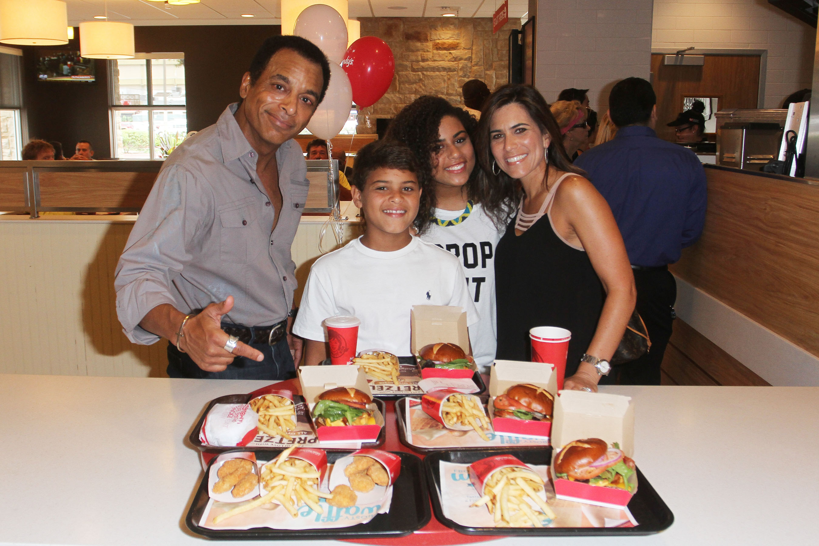 Two time Grammy Award Winner Jon Secada Surprises Customers at his Childhood Wendys Restaurant