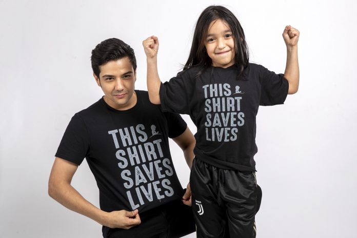 Luis Coronel with St. Jude patient Ashley.