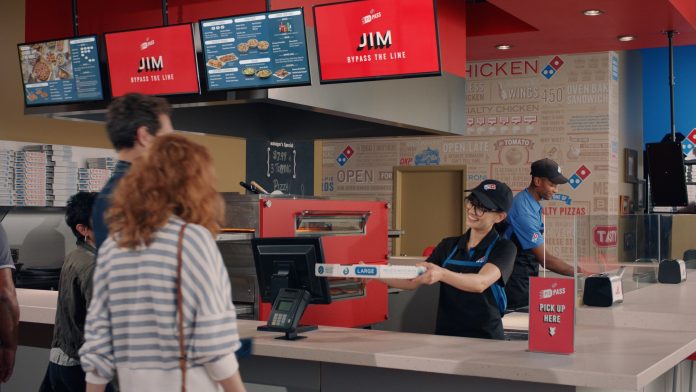 Domino’s new Pie Pass technology allows customers who order and pay online to skip the line and grab their order.