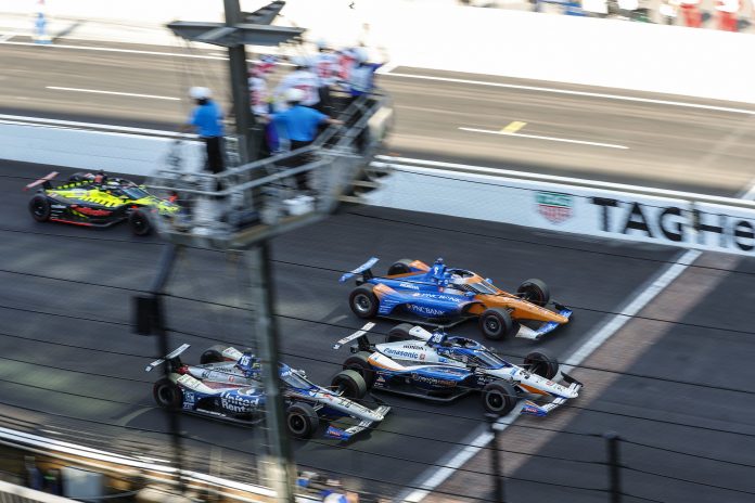Takuma Sato (center) led a Honda sweep of the top four finishing positions at today's Indianapolis 500. Scott Dixon (#9, top) finished second, followed by Graham Rahal (#15) and Santino Ferrucci.